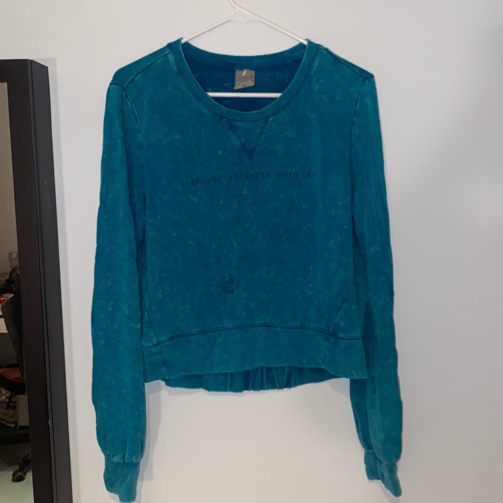 Carrie Underwood “surround yourself with love” sweater